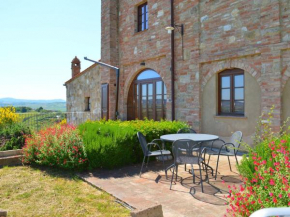 Гостиница Apartment with 2 pools in the village of Asciano in the hills of Siena  Ашано